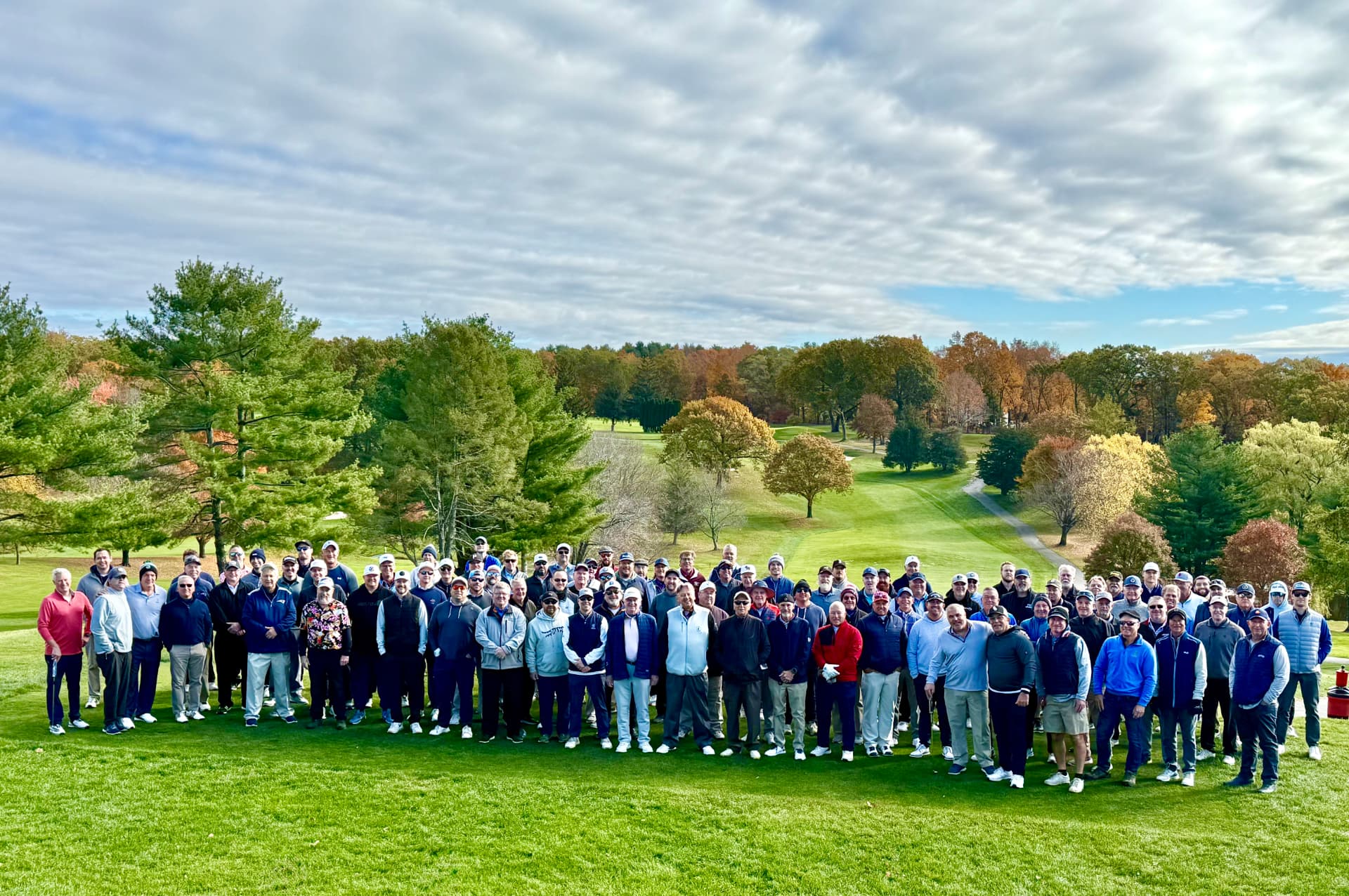 Golfers gathered at the 2025 AssMan Open